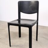 Pair of Matteo Grassi chairs in black saddle leather, 1980s.