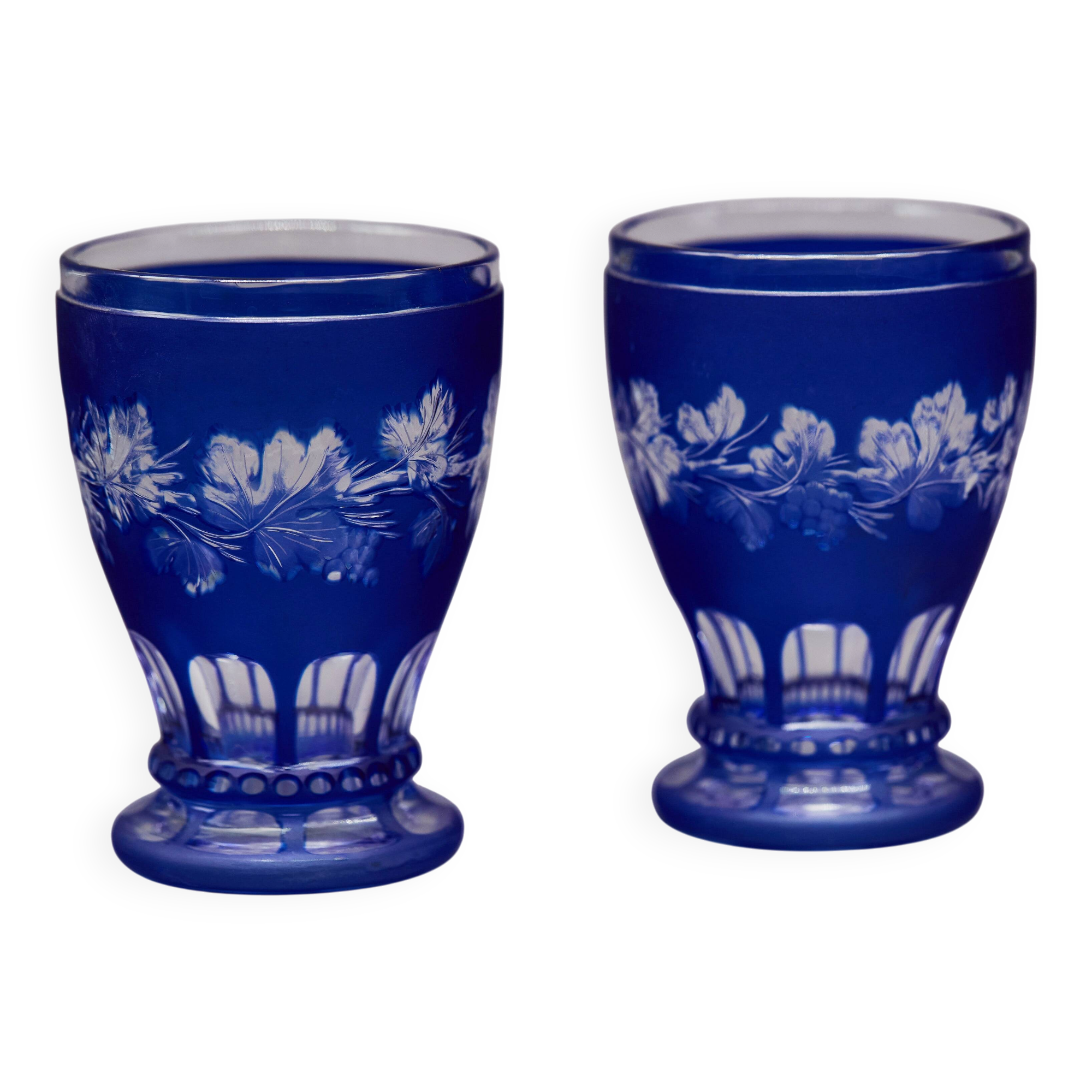 Pair of cut cobalt blue Bohemian crystal glasses on stems — Circa 1900
