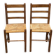 2 solid wood and straw chairs