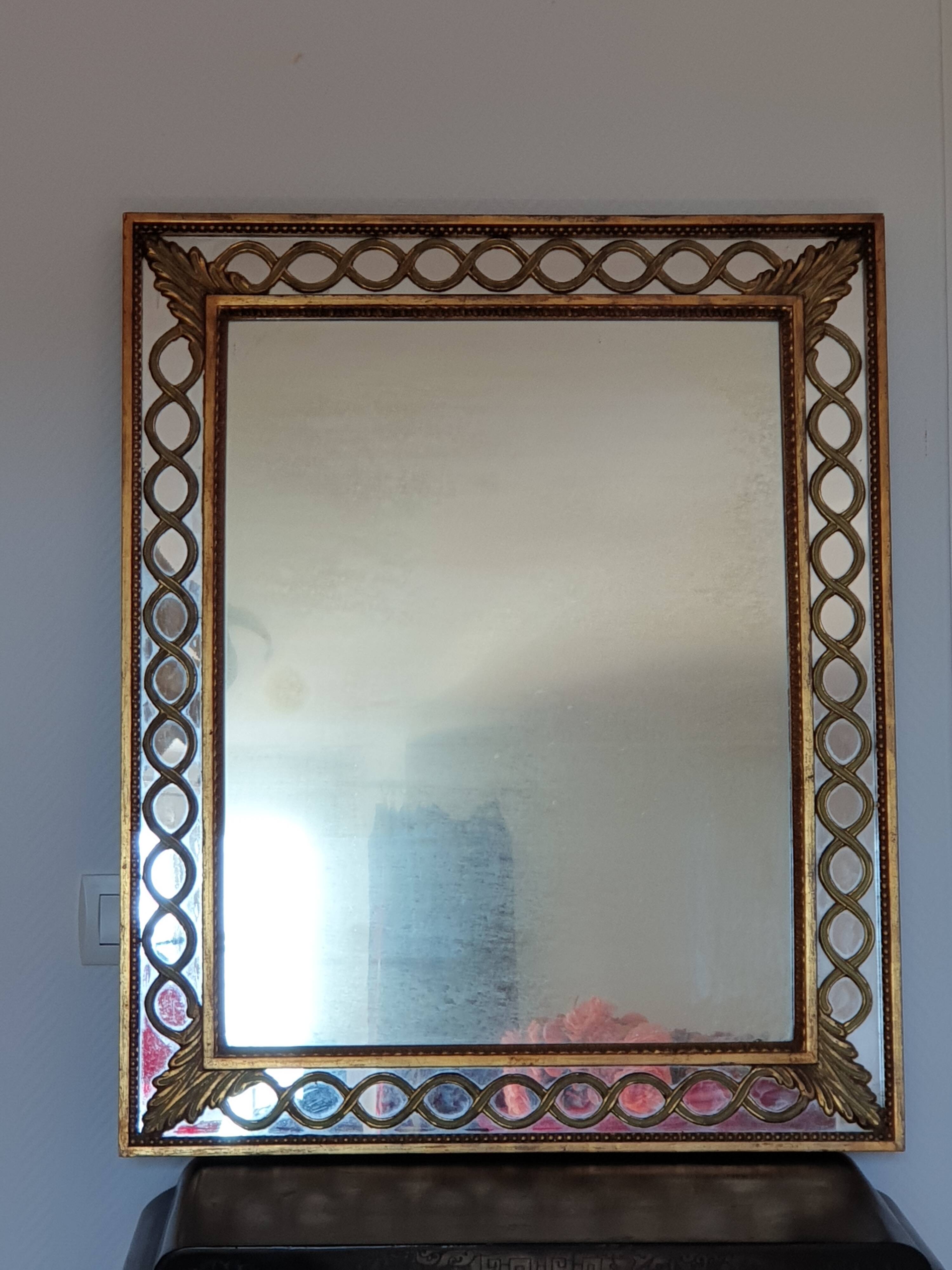 Classic antique mirror in gilded wood
