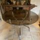 Vintage table with smoked glass top