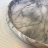 Empty round pocket in gray marble