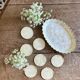 Lot of mother-of-pearl aperitif items, 7 coasters and a dish.