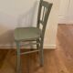 Chaise bistrot Luterma vintage verte grisée