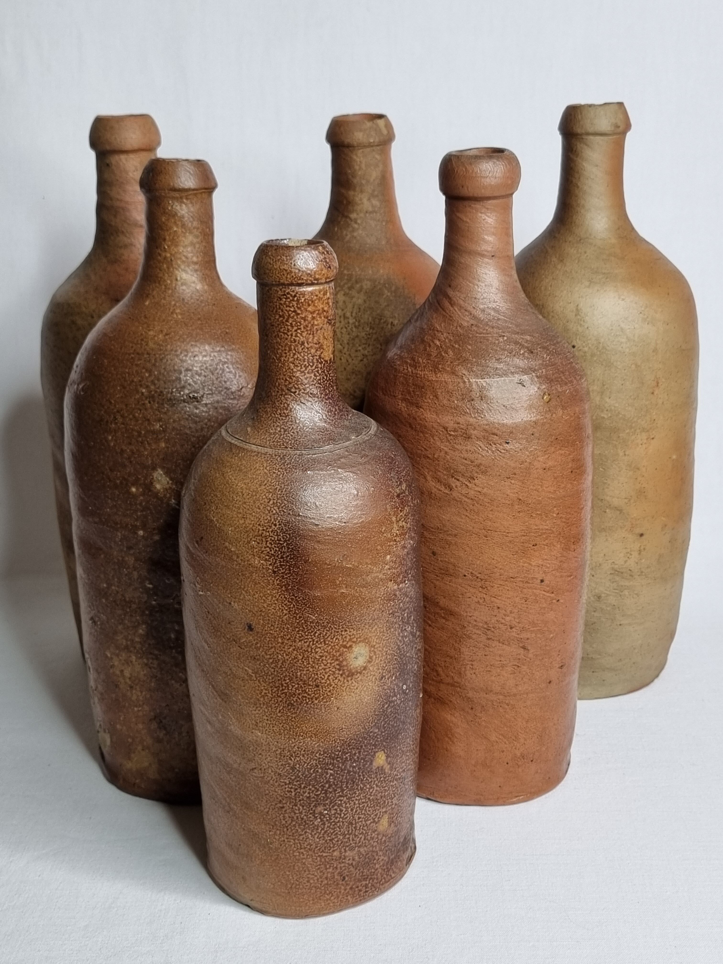 Set of 6 hand-turned stoneware bottles, 31 cm
