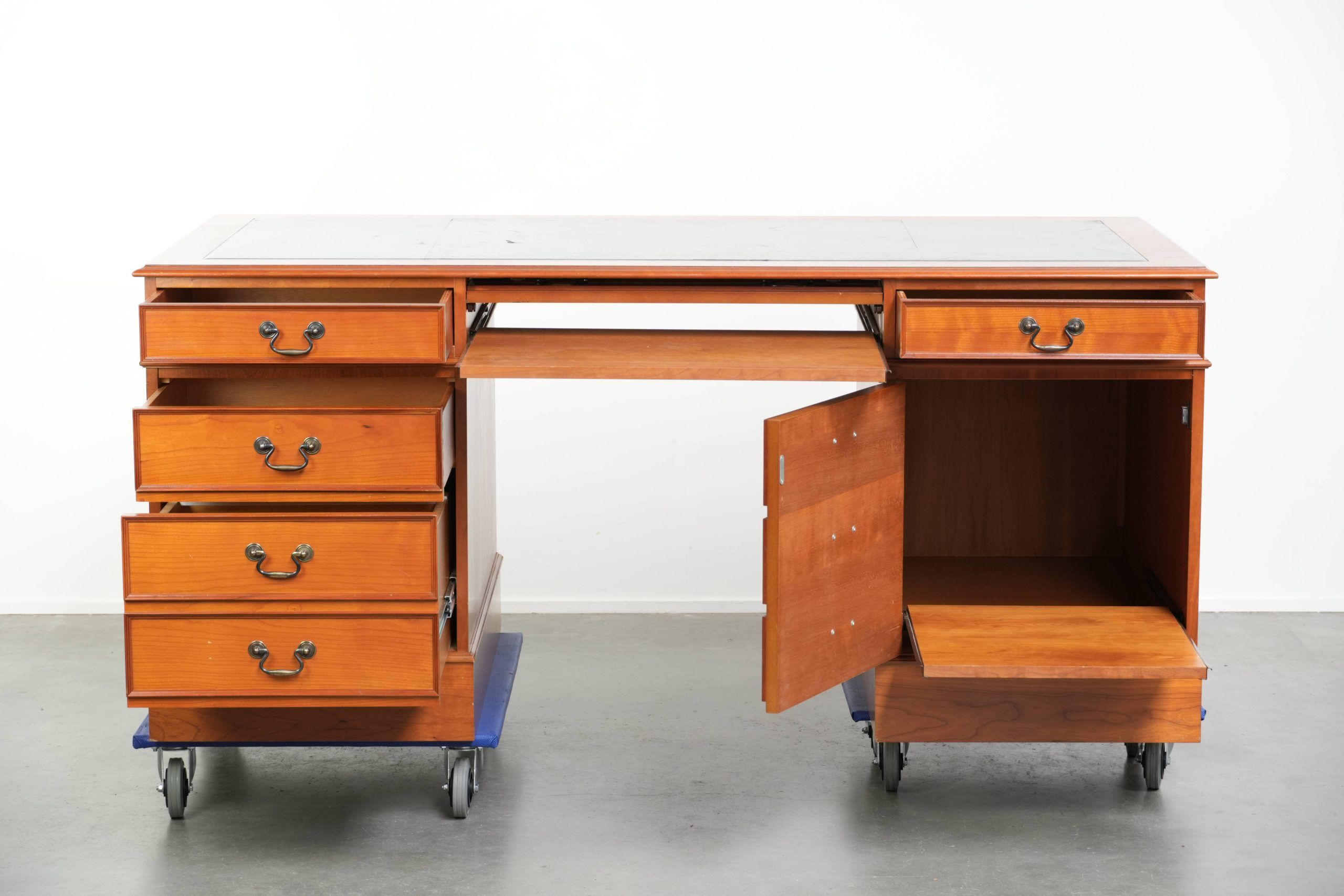Classic wooden desk in English style with 4 drawers and a blue leather top