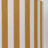 Sandstone lamp and striped lampshade