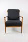 Black boucle chair, Danish design on the cushions, 1970s.