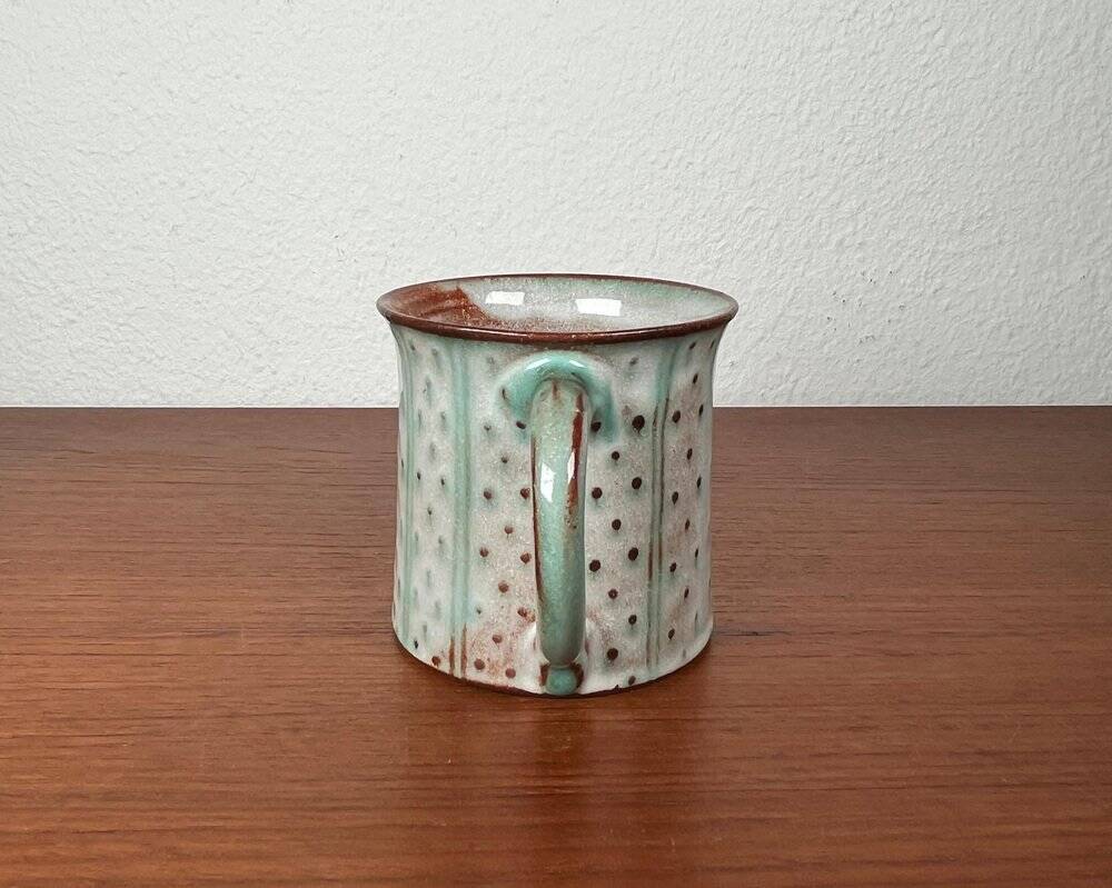 Mid-century modern studio pottery mug by Monika Maetzel, 1960s.