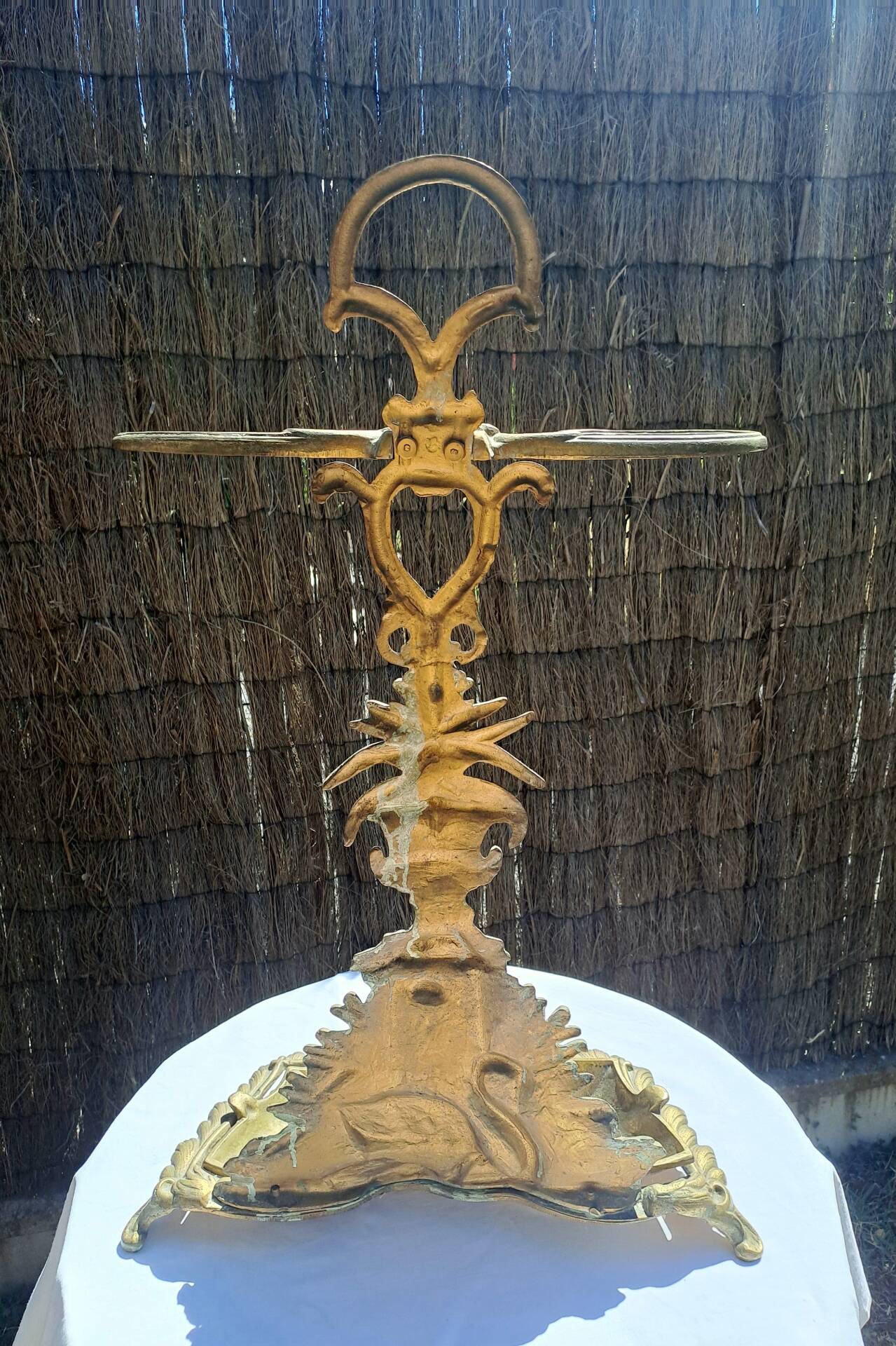 Bronze and brass umbrella stand decorated with a swan.