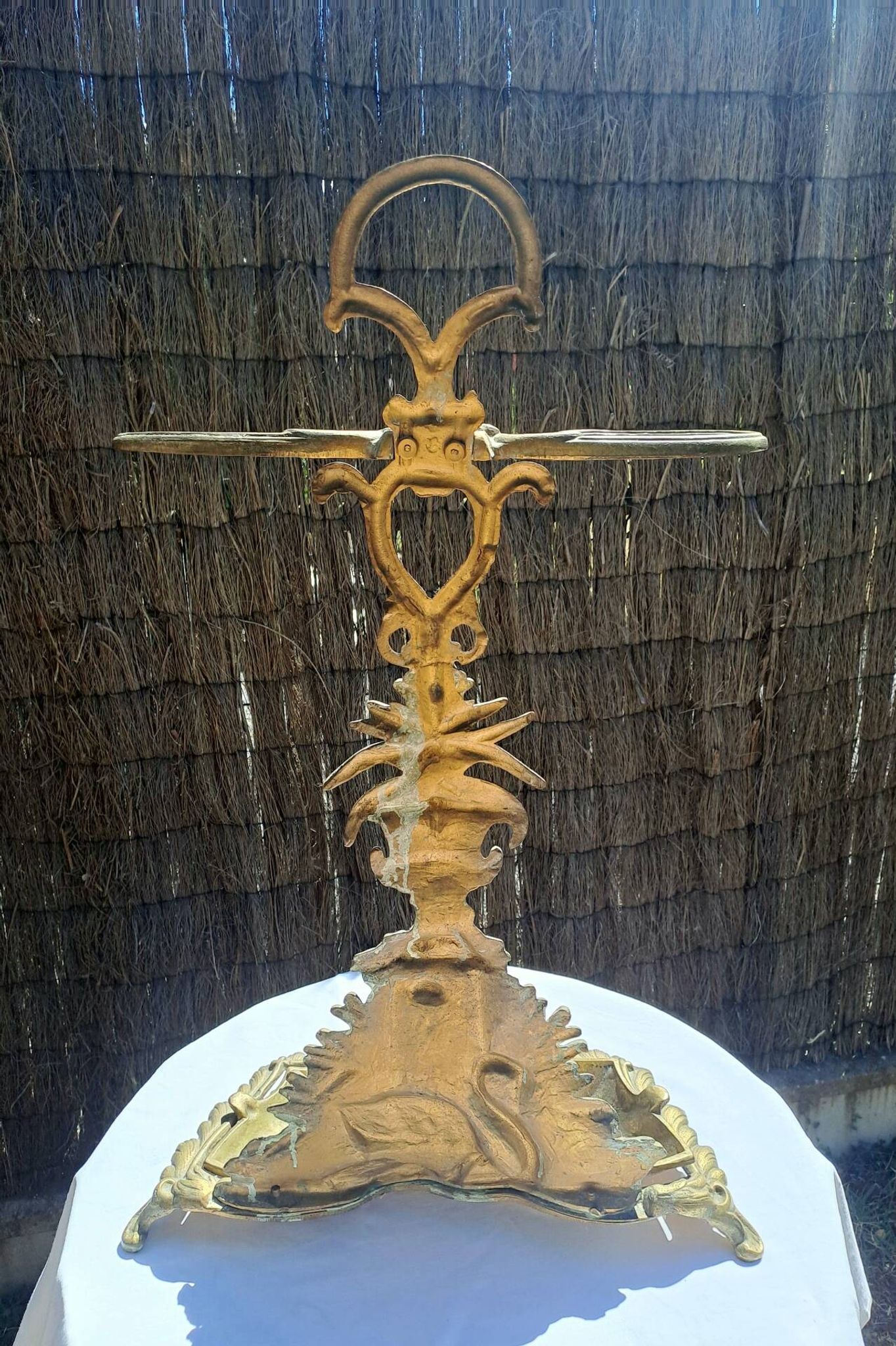 Bronze and brass umbrella stand decorated with a swan.