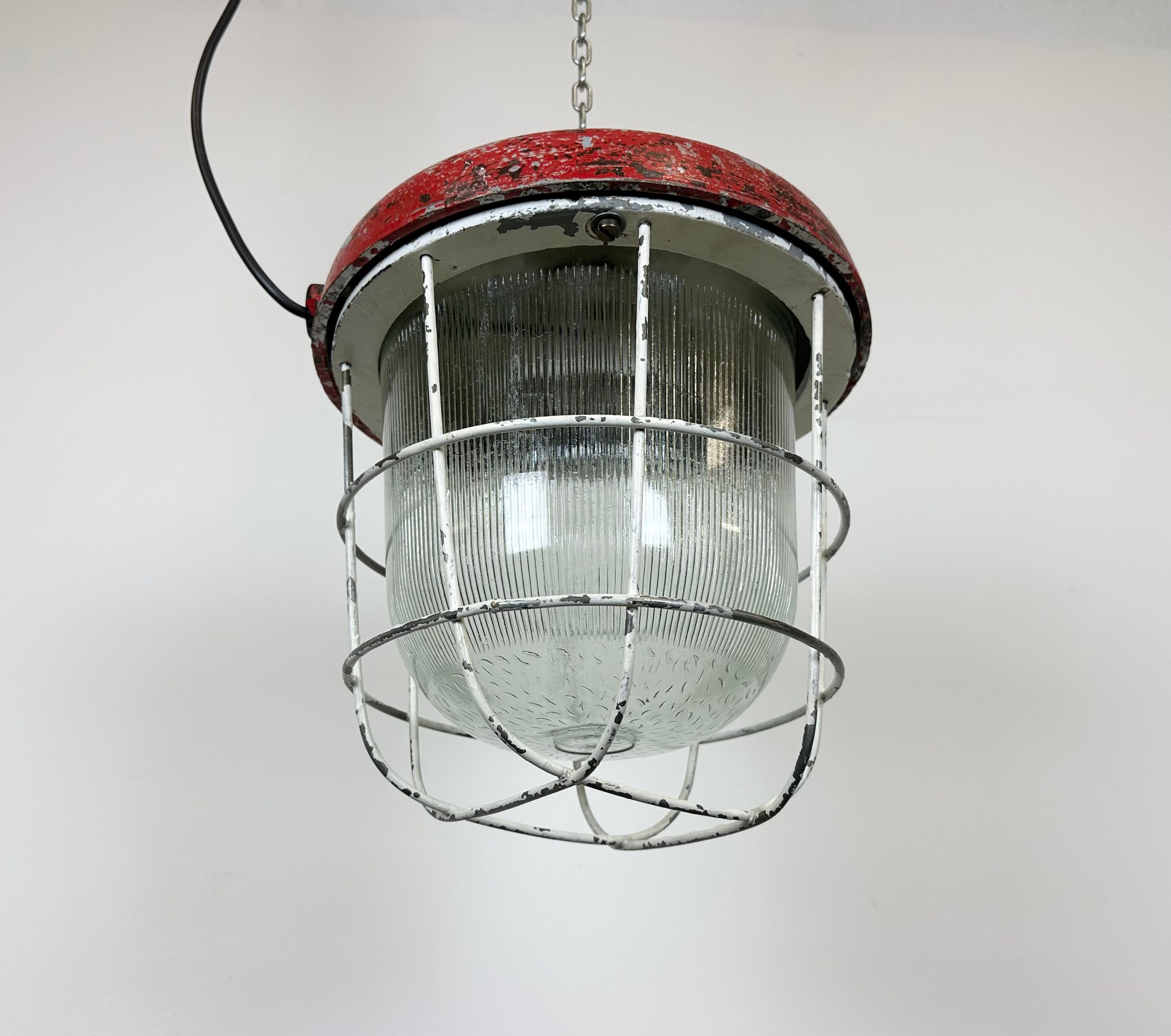 Red industrial cast iron cage pendant light, 1960s