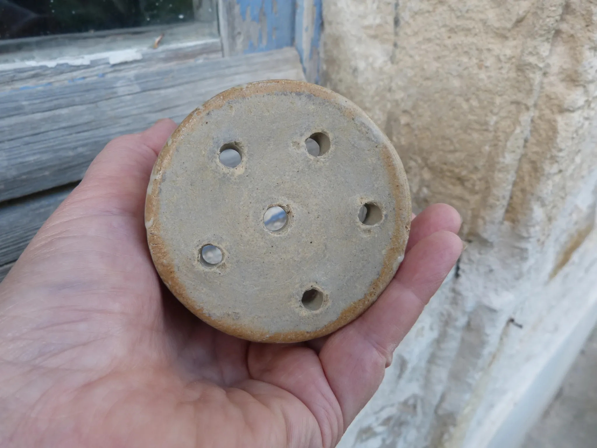 Vintage cheese draining pot in antique stoneware