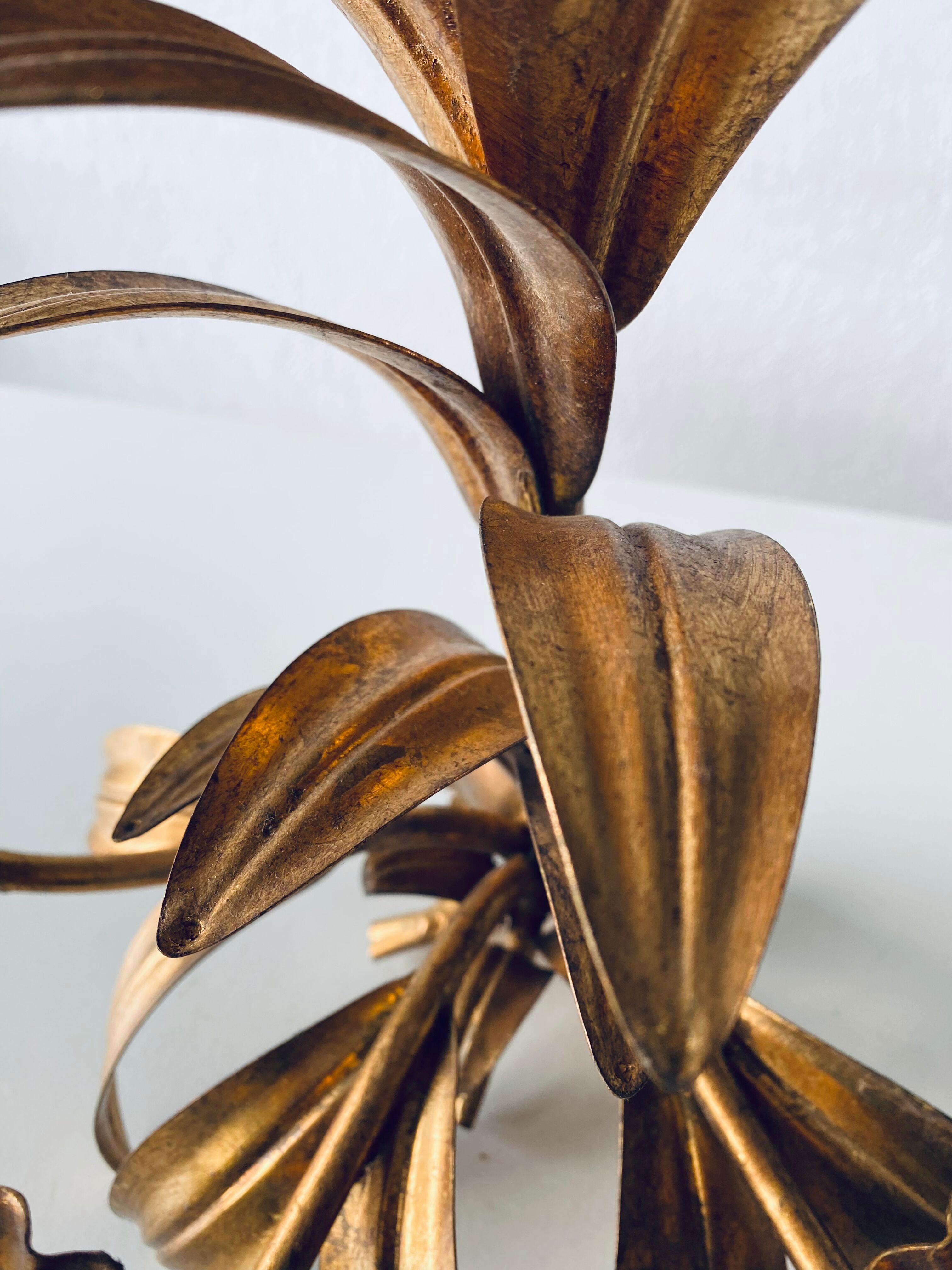 Golden leaf wall light