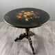 Napoleon III guéridon table in black lacquered wood with floral painted decoration, 19th century.