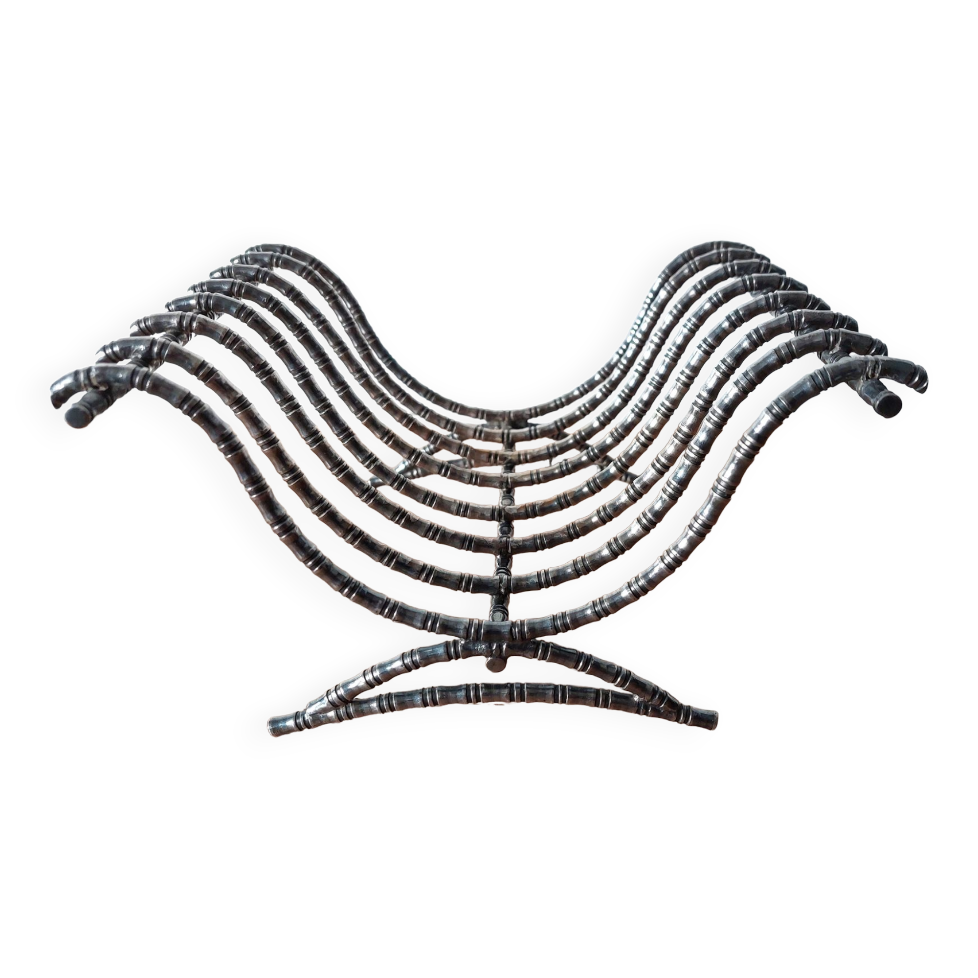 Silver metal cut in imitation of vintage bamboo.