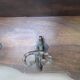 Large antique wall-mounted coat rack in carved wood 135 cm