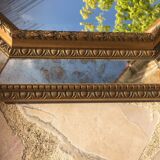 Antique mirror in gilded wood with beveled octagonal shape 72 x 63 cm