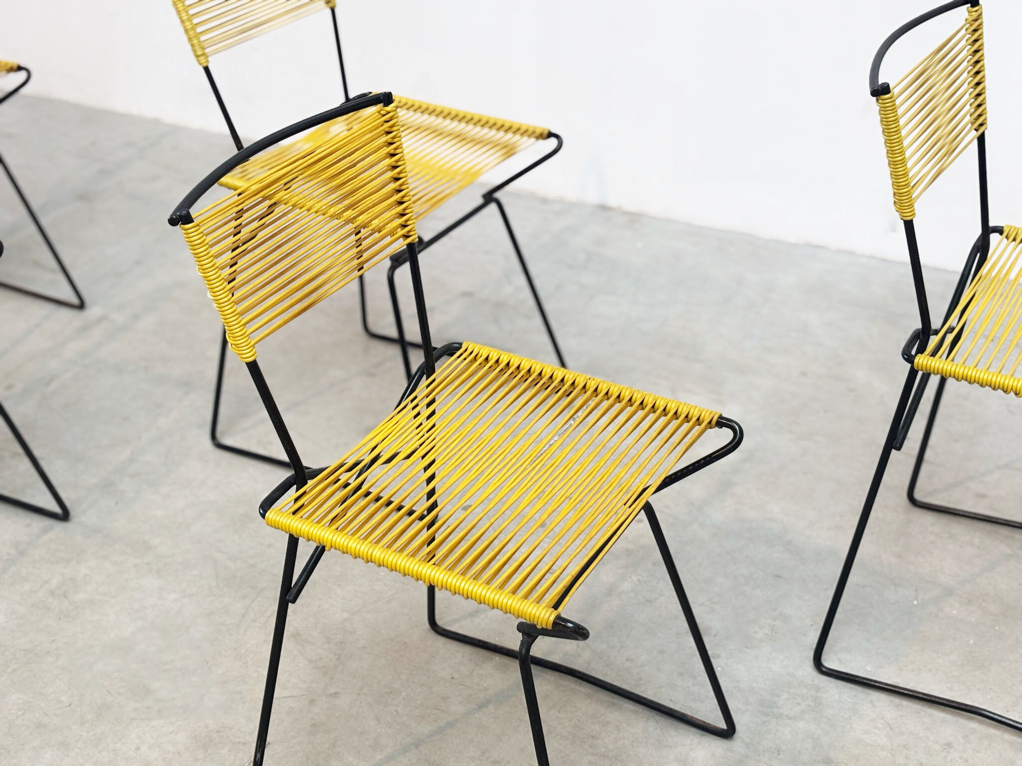 Set of six 'Spaghetti' dining chairs