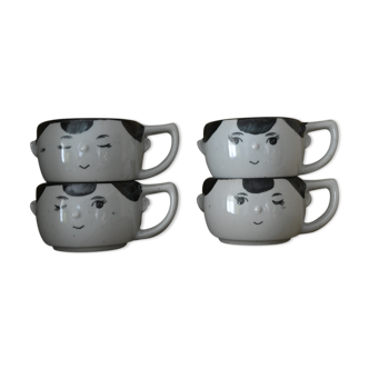 Set of 4 sandstone cups faces