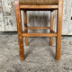 Tabouret ancien en bois sculpté et paille