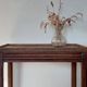 Vintage wooden wheeled side table/console.
