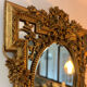 Antique mirror with gold leaf parecloses