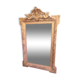 Old gilded mirror with pediment