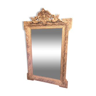 Old gilded mirror with pediment