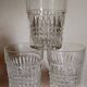 Trio of vintage whiskey glasses in pimpled glass