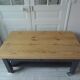 Coffee table on casters, 1 drawer, 1 shelf, re-enchanted in slate gray, wooden top.