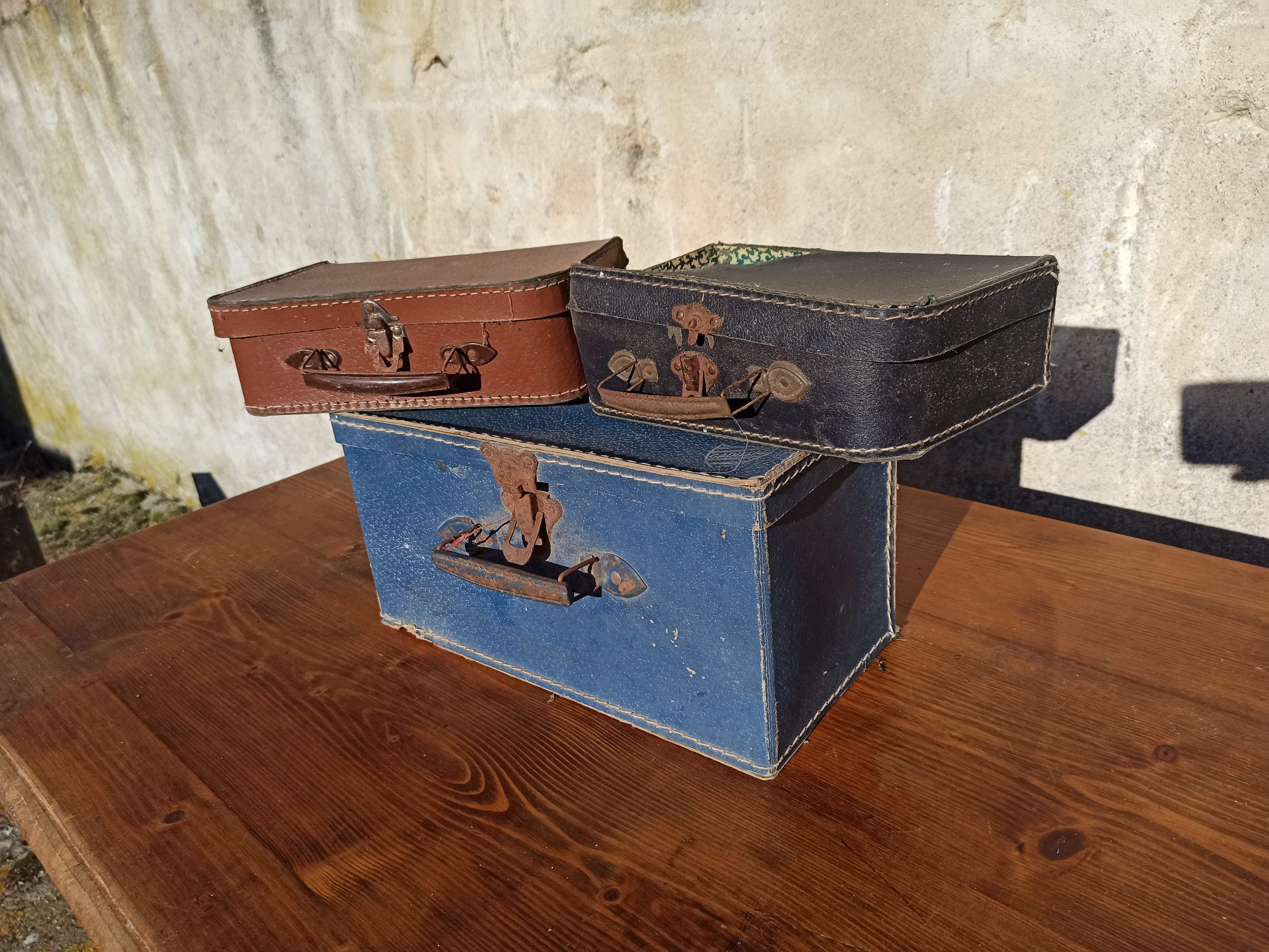Set of 3 old cardboard suitcases