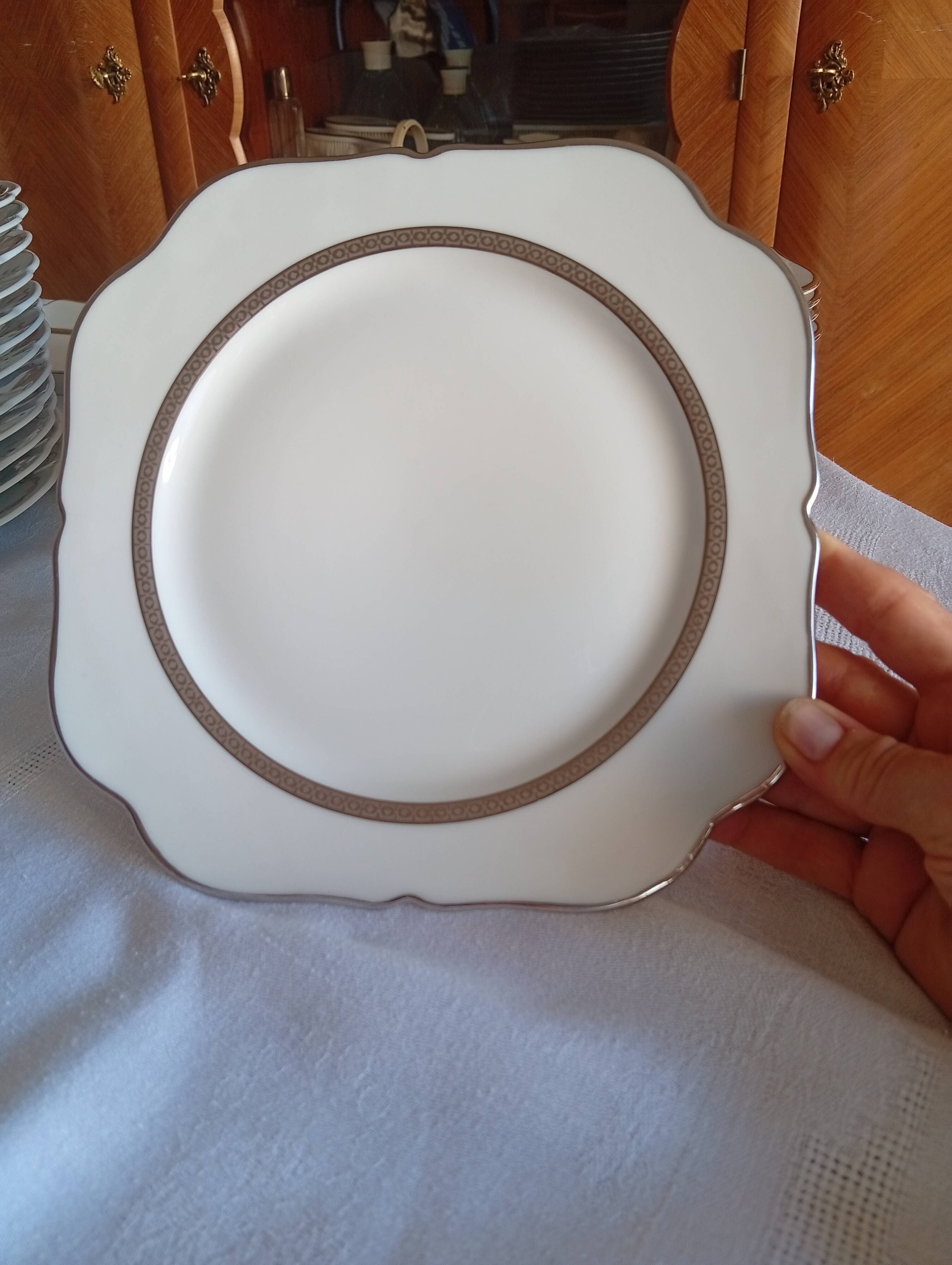 Jean BOYER Limoges FRANCE part of a white porcelain table service.