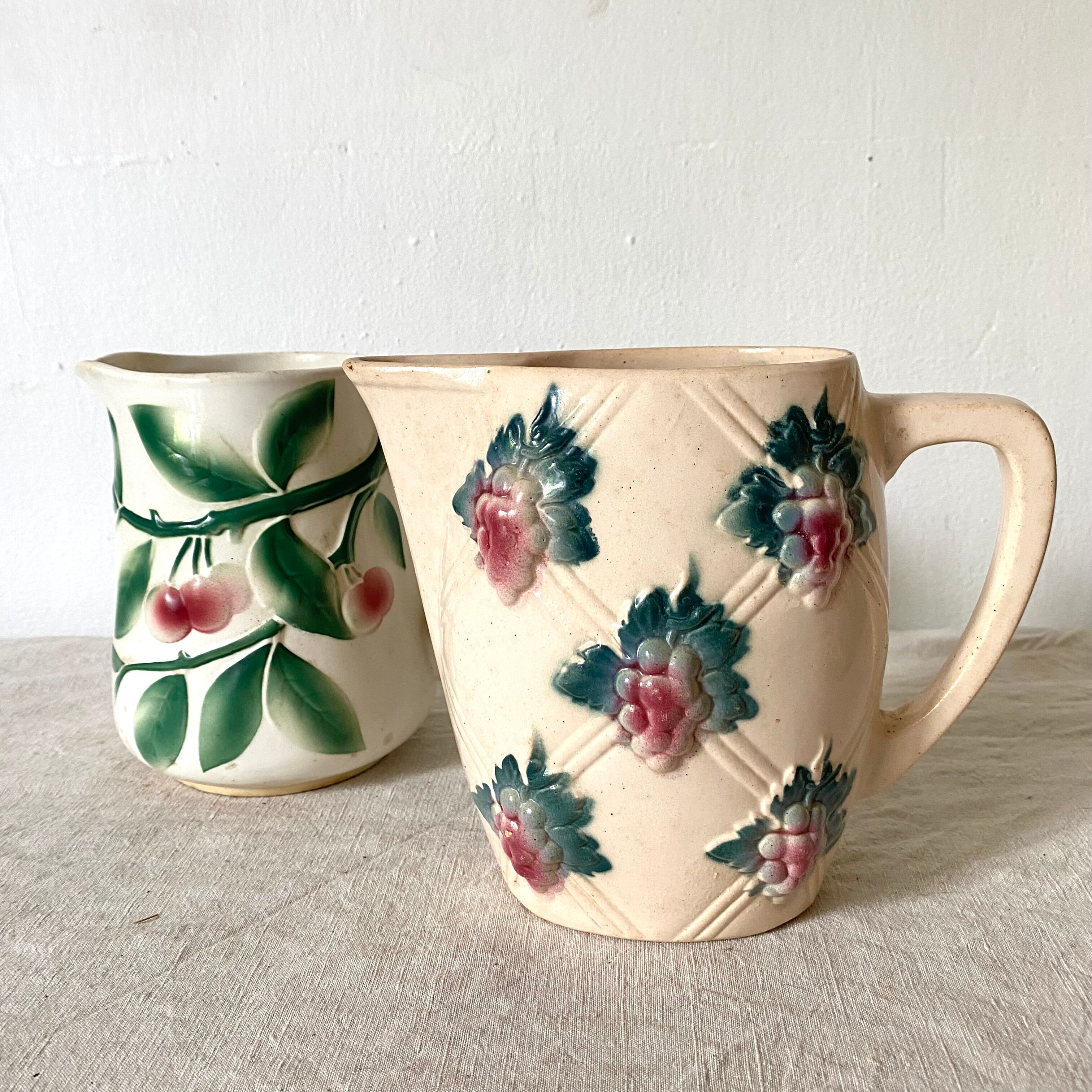 Antique pitcher in Digoin slip