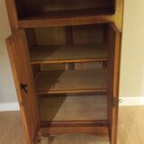 Small table and cherry wood sideboard.