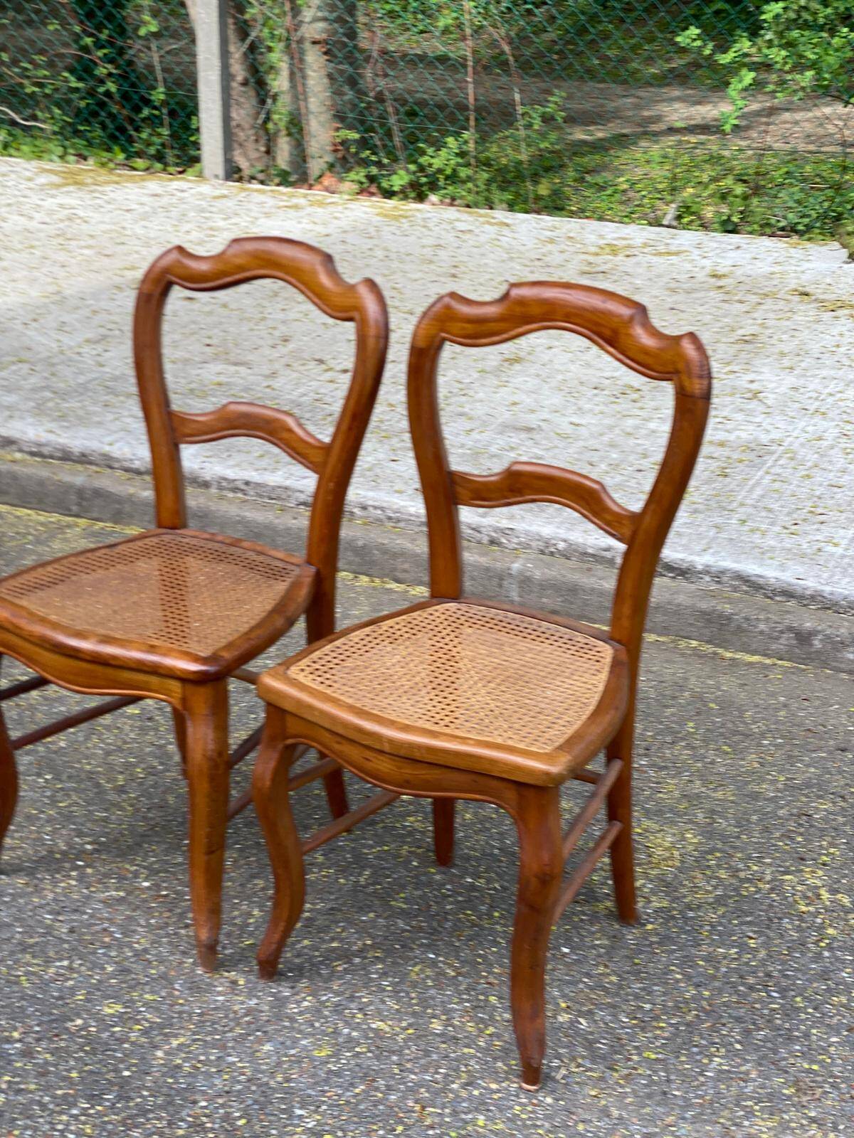 2 Louis Philippe caned chairs from the 19th century in solid wood.