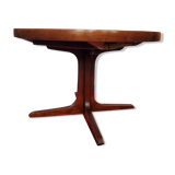 Baumann style round table with integrated extensions from the 70s