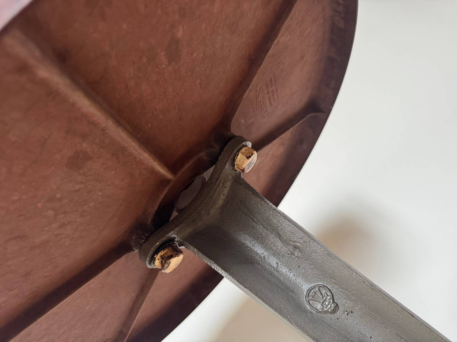 Rare Louis Vuitton cast iron bistro table with a bakelite top.