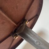 Rare Louis Vuitton cast iron bistro table with a bakelite top.