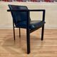 Set of 3 designer leather and metal armchairs.