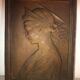 Patinated limestone bas-relief profile of a young woman
