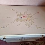 Wooden sideboard with floral patterns