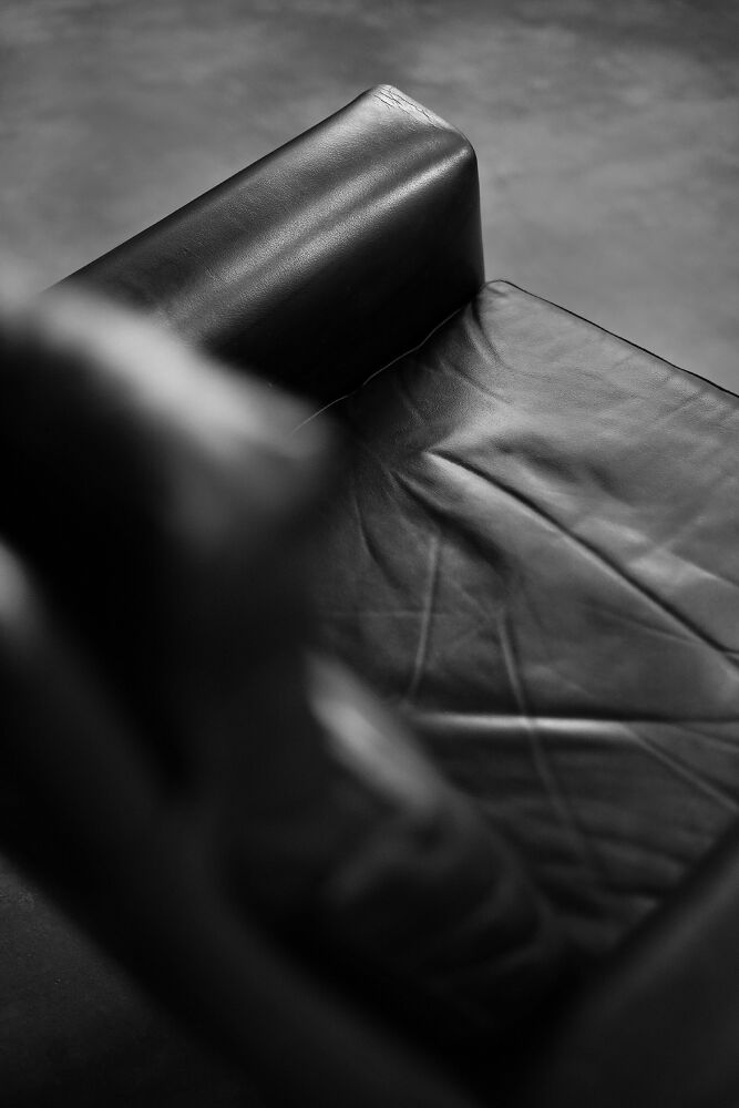 Mid-century danish modern minimalist black leather swivel armchair by georg thams, 1960s