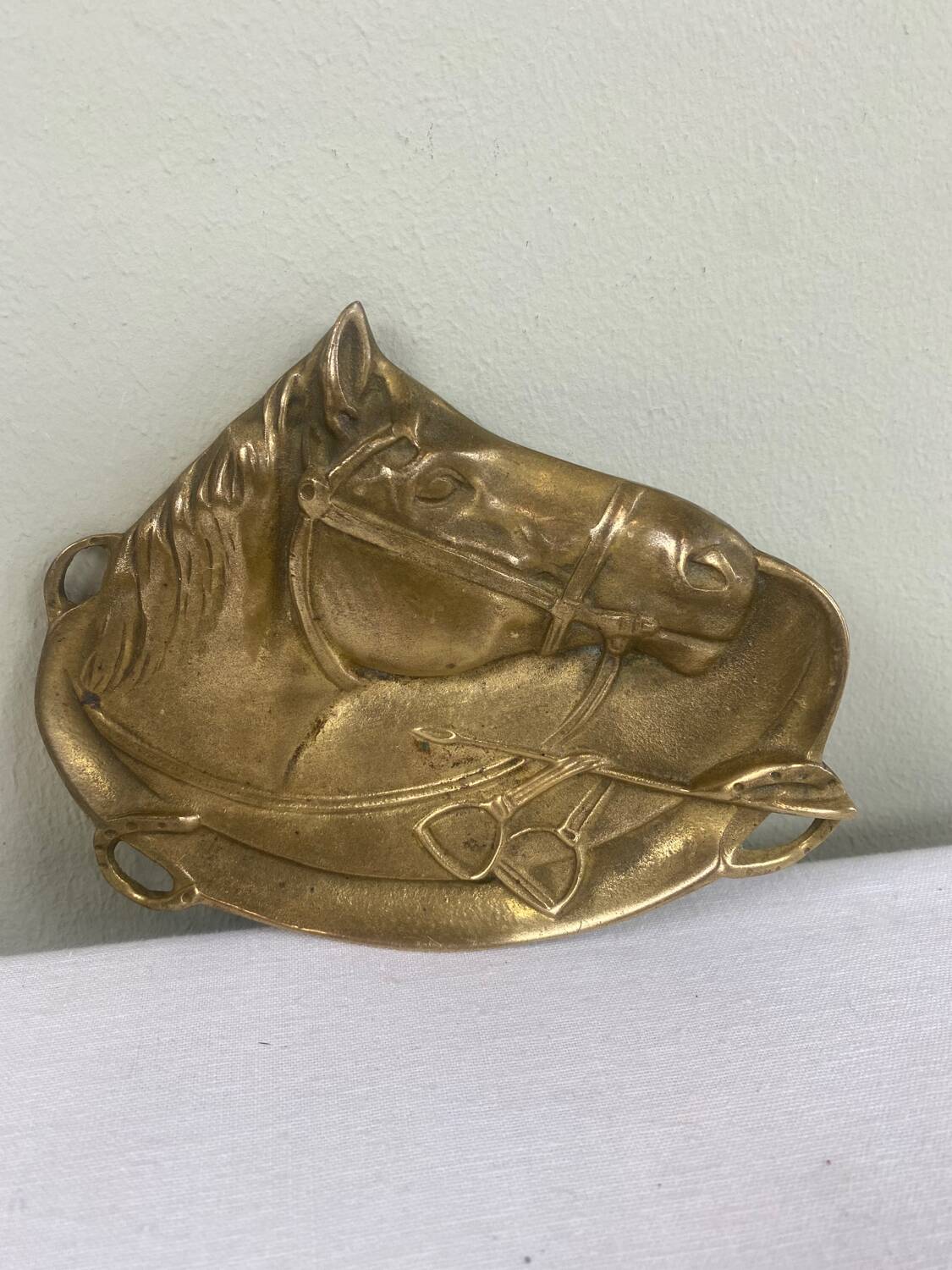 Antique brass pocket emptier