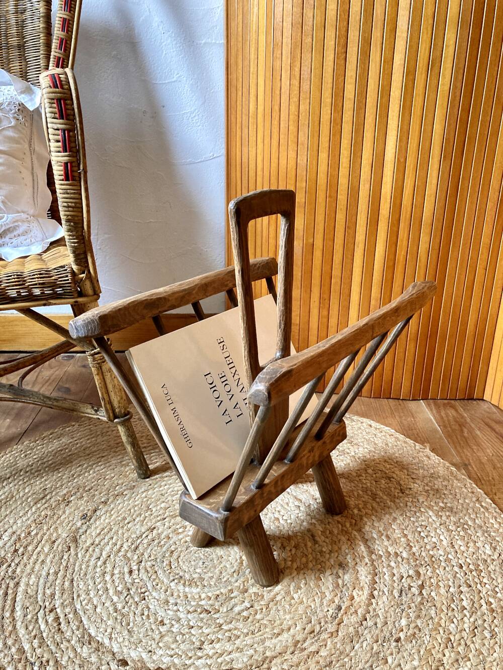 Brutalist magazine rack in the style of Jean Touret, 1950s.