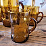 Orangeade set with pitcher and 6 amber glass glasses with "woven" fabric surround