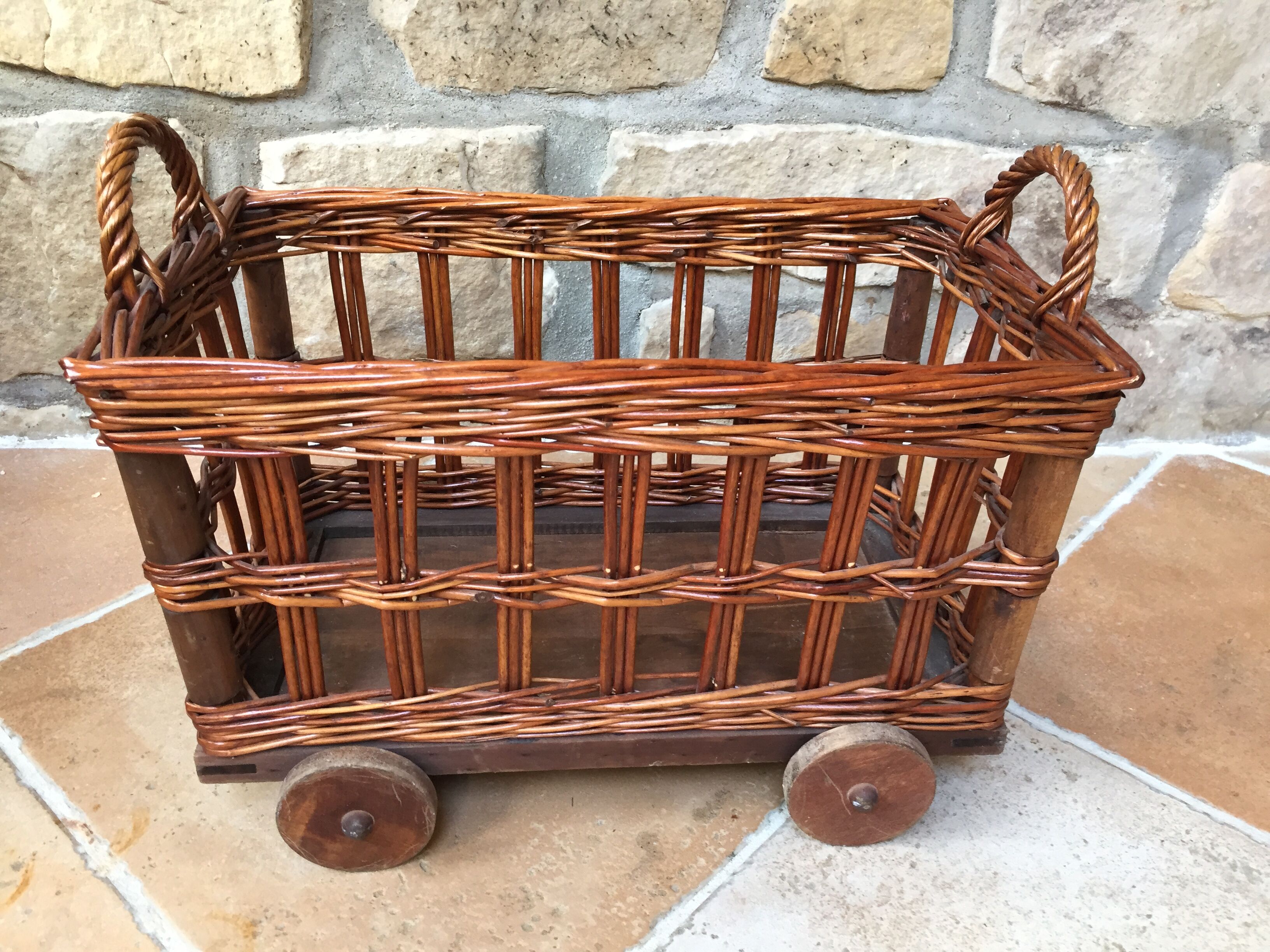 Small wicker wheeled cart