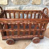 Small wicker wheeled cart