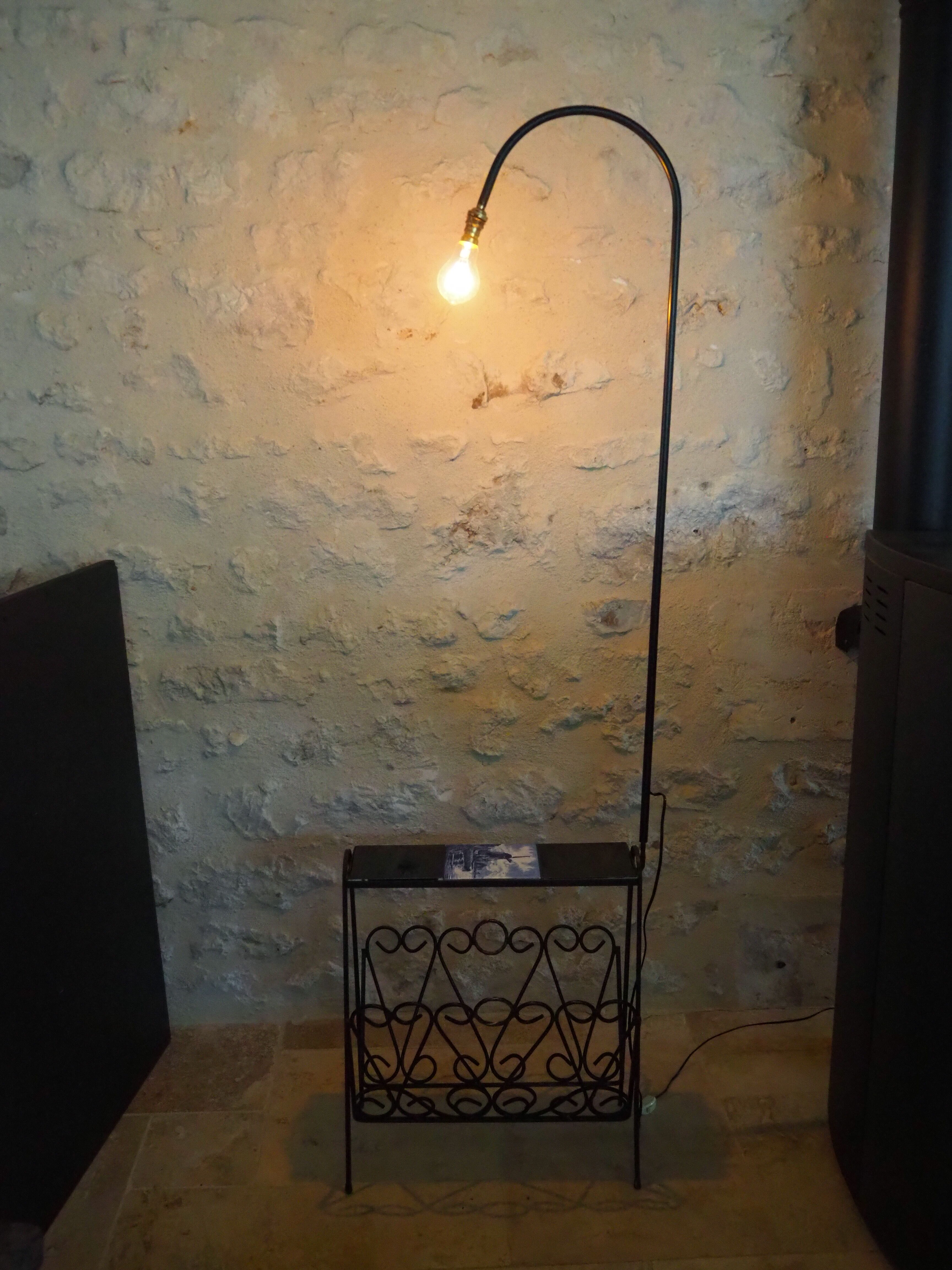 1970s black wrought iron ironing board with enamelled tiles
