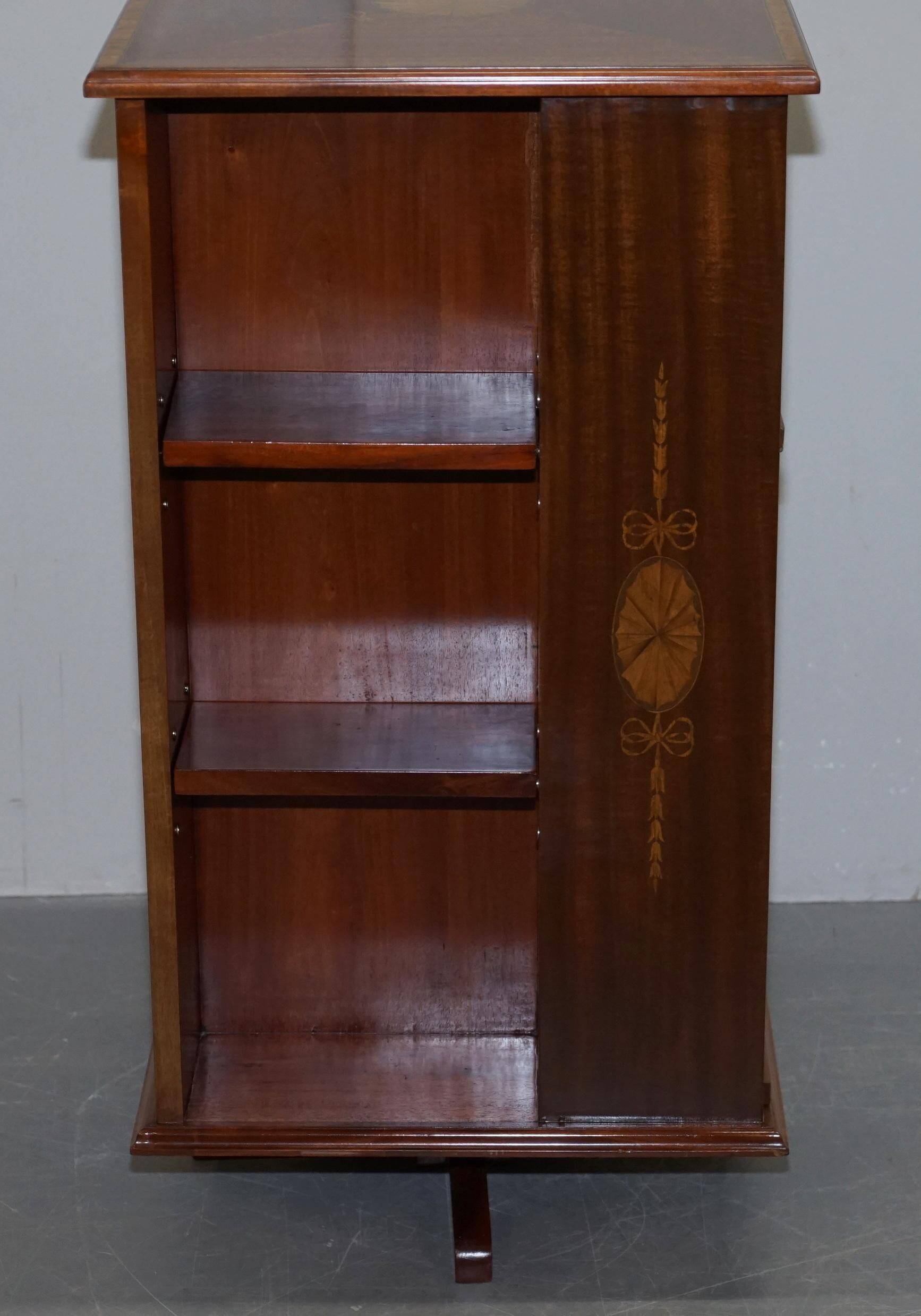 Edwardian burr walnut revolving bookcase with Sheraton inlays circa 1900
